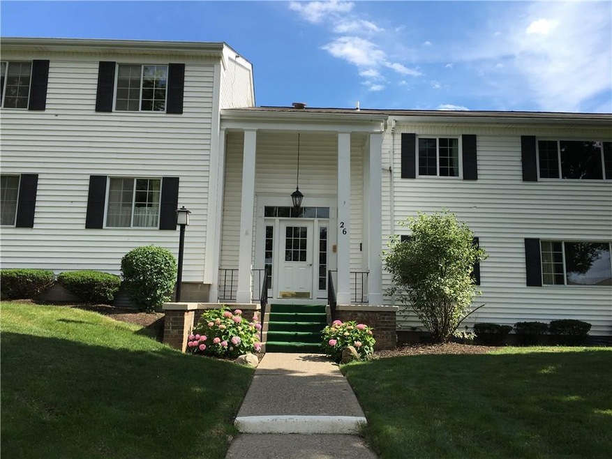 The well-groomed yard and lovely flowers greet res