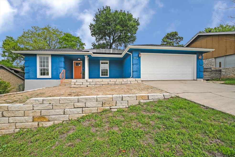 Ranch-style house with driveway, a garage, and so