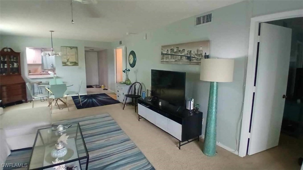 Living room with newer  light beige carpet