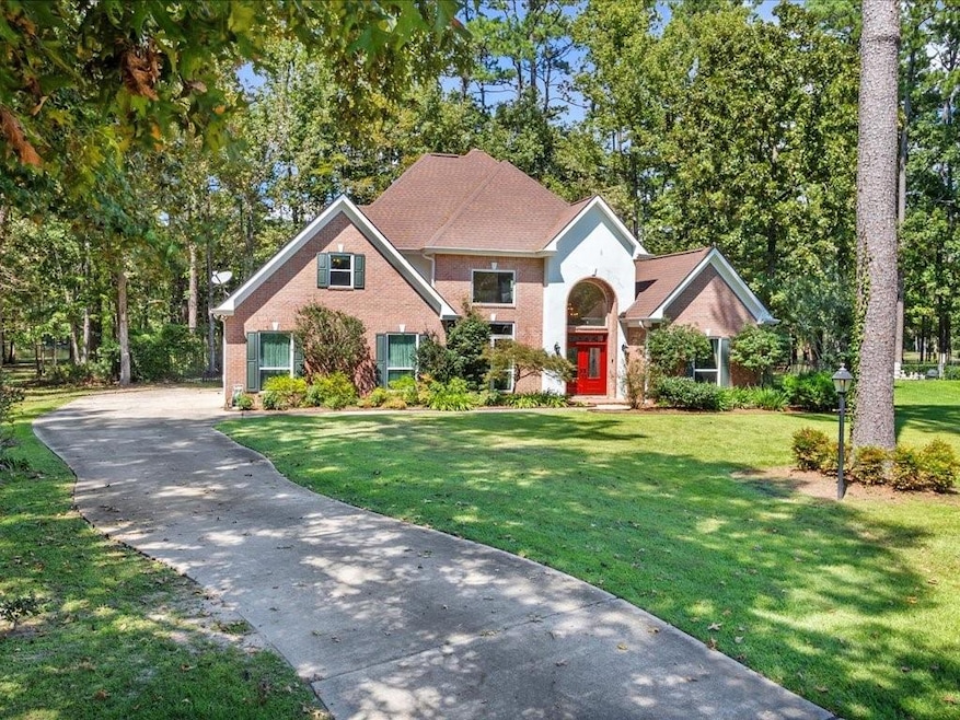 Custom built home w/ architectural details in desirable gated community.