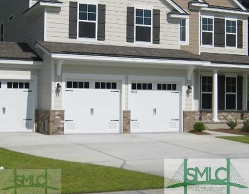 Exterior Front. Front elevation LE with three car 
