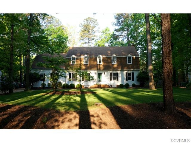 East facing Dutch Colonial just 1/2 block from the