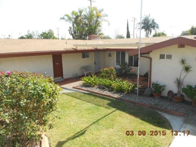 Enjoy a private, gated front yard with a lattice c