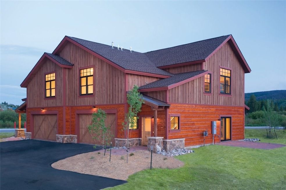 Exterior of the home has a rustic mountain feel.