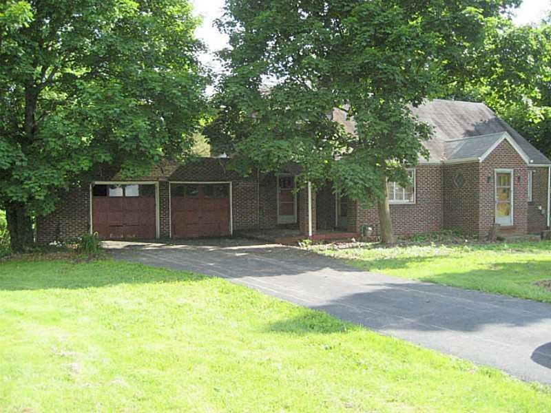 Exterior Front. Level front yard.