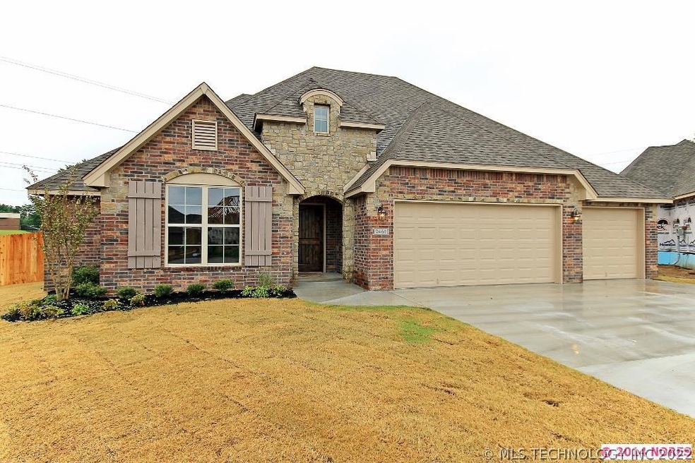 Full brick with real stone entry and 3 car garage