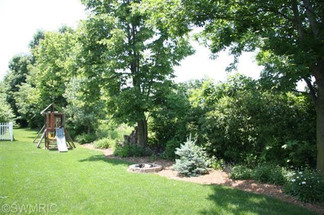 8299 Hawkshead SE unit 63, Byron Center, MI 49315 - photo 1