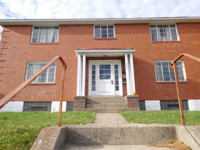 Exterior Front. All brick exterior.