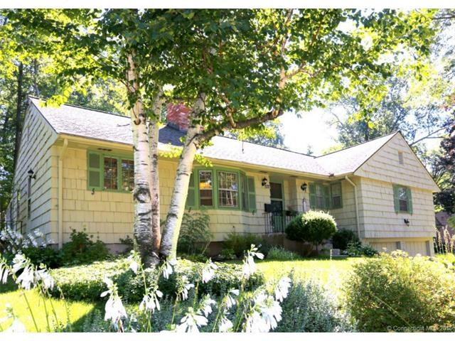 Lovely ranch nestled in an oversized lot at the en