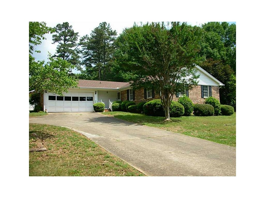 Exterior Front. Nice, level, pretty front yard.