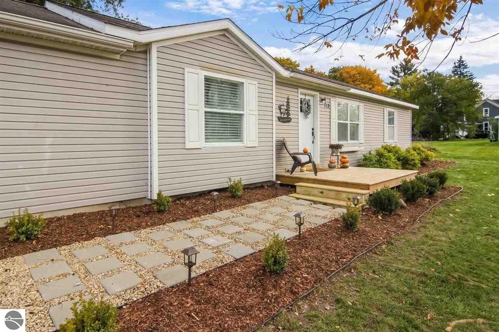 112 N Brand St, Elk Rapids, MI 49629 - photo 1