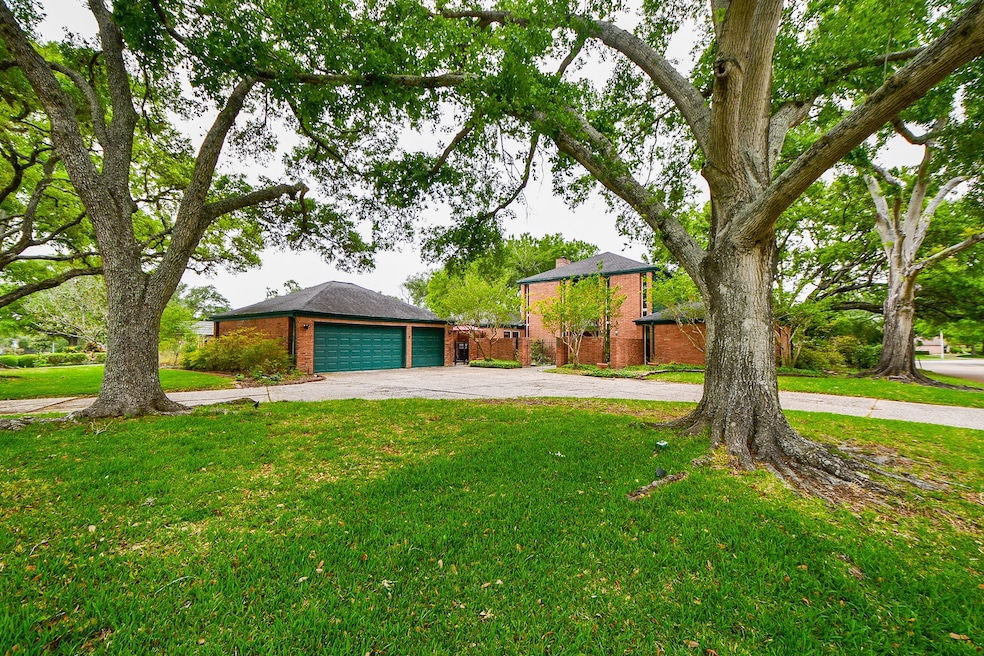 Stately home on gorgeous wooded lot.  Circular dri