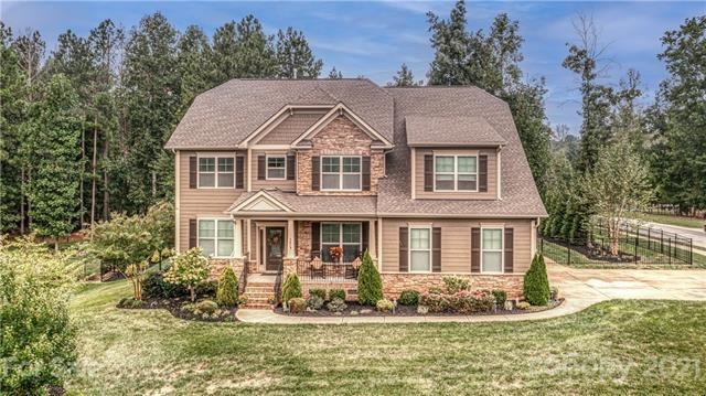 Private corner half acre + lot.