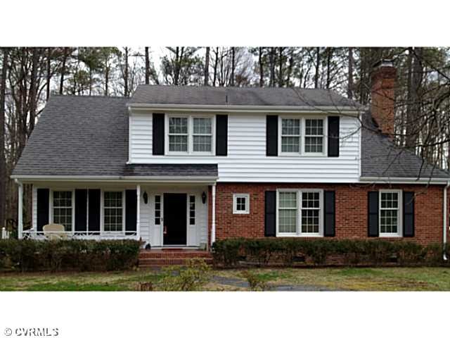 Exterior Front - Maintenance free! Brick, new viny