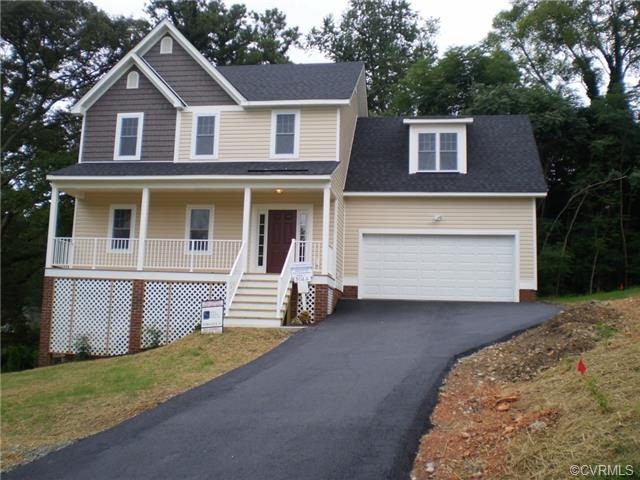 Finished front elevation with paved driveway