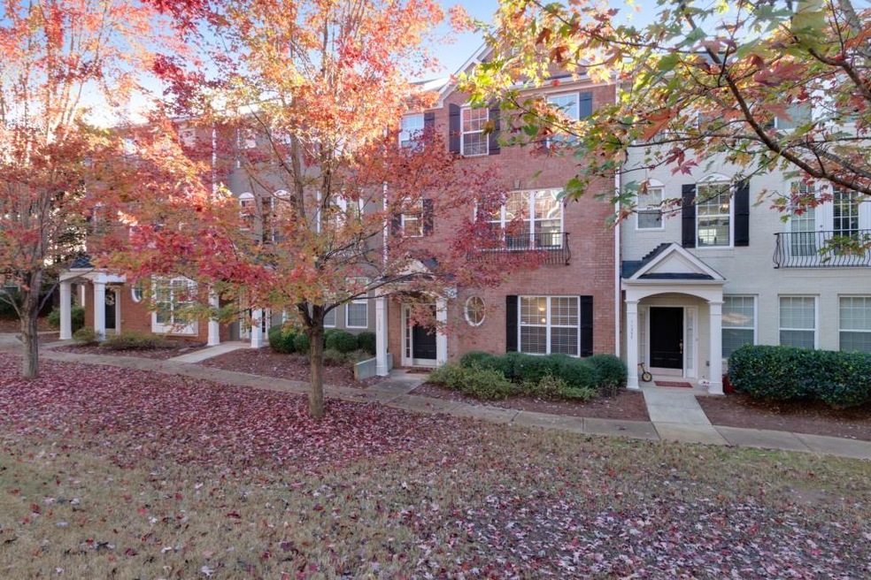 Three level brick townhome overlooking beautiful w
