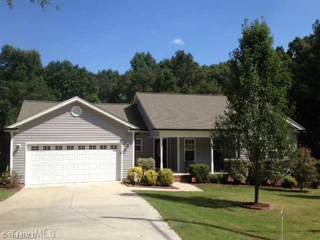 Exterior Front. Wonderful family home...with a rocking chair front porch.