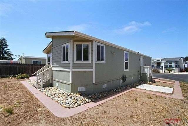 Mobile home is orientated to the back facing the c