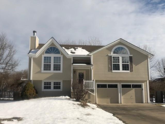 207 S Darrowby Dr, Raymore, MO 64083 - photo 1