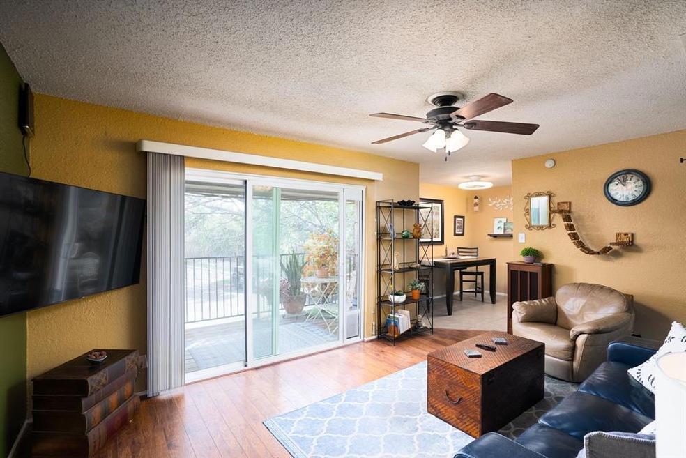 Lovely condo with a covered balcony and large slid