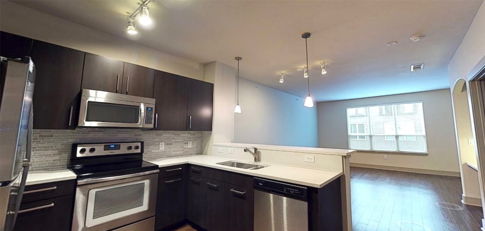 1340 W Gray St unit 203, Houston, TX 77019 - photo 1