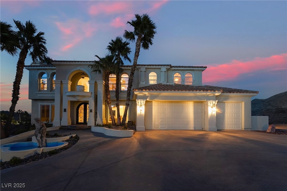 Mediterranean / spanish-style house with a garage,