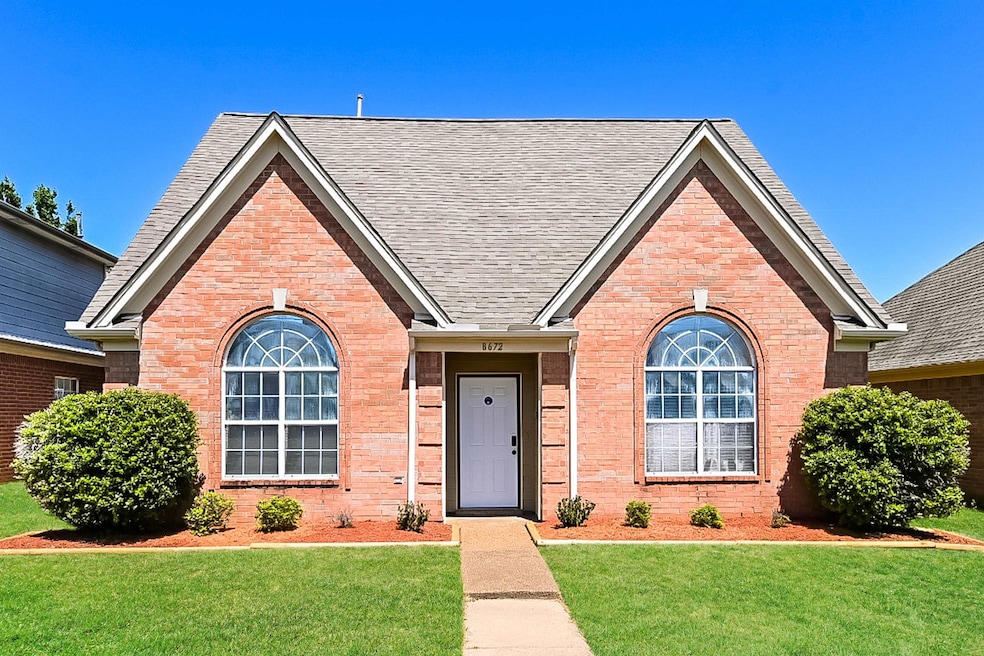 Ranch-style house featuring brick siding, roof wit