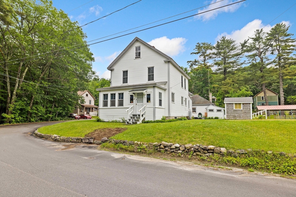 Front of home, on a corner lot