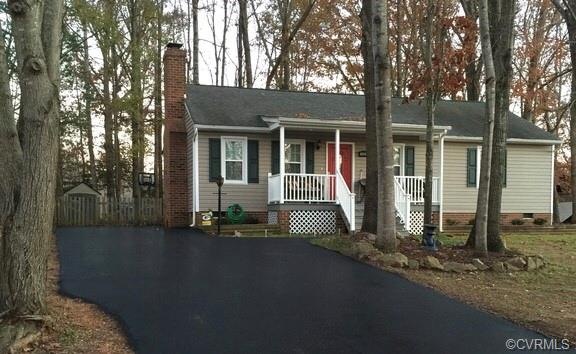 recently installed and sealed asphalt driveway