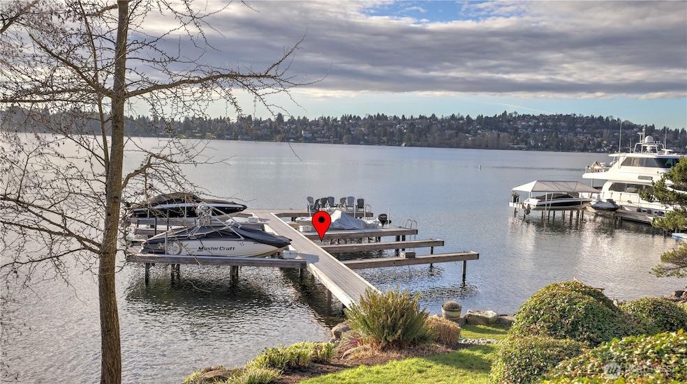 Shared dock includes an assigned 25± ft boat slip.