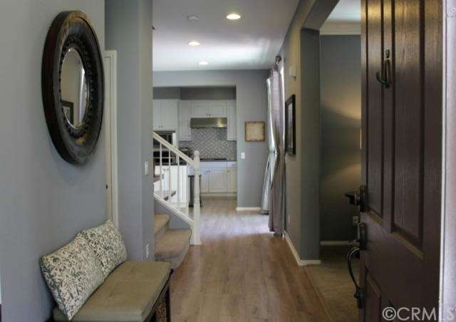 Entering front door - living room on right, kitche