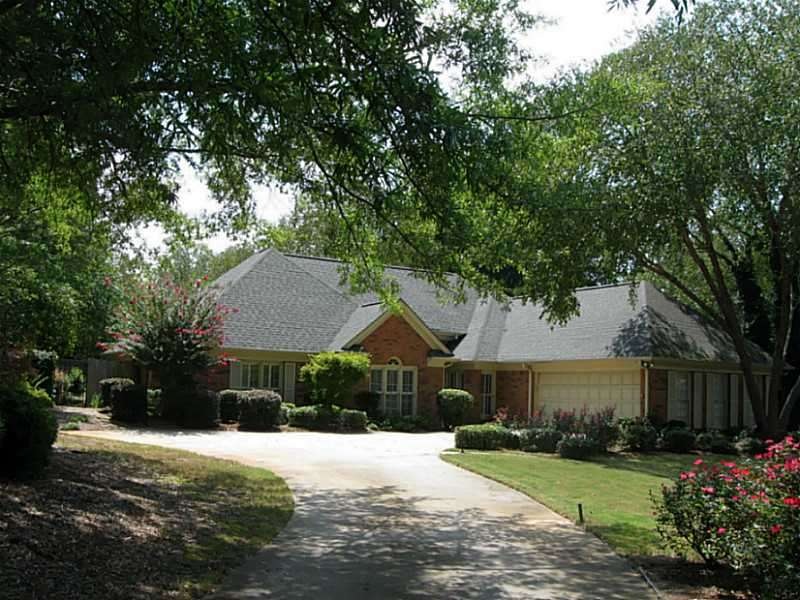 Exterior Front. Great lot  mature trees and planti