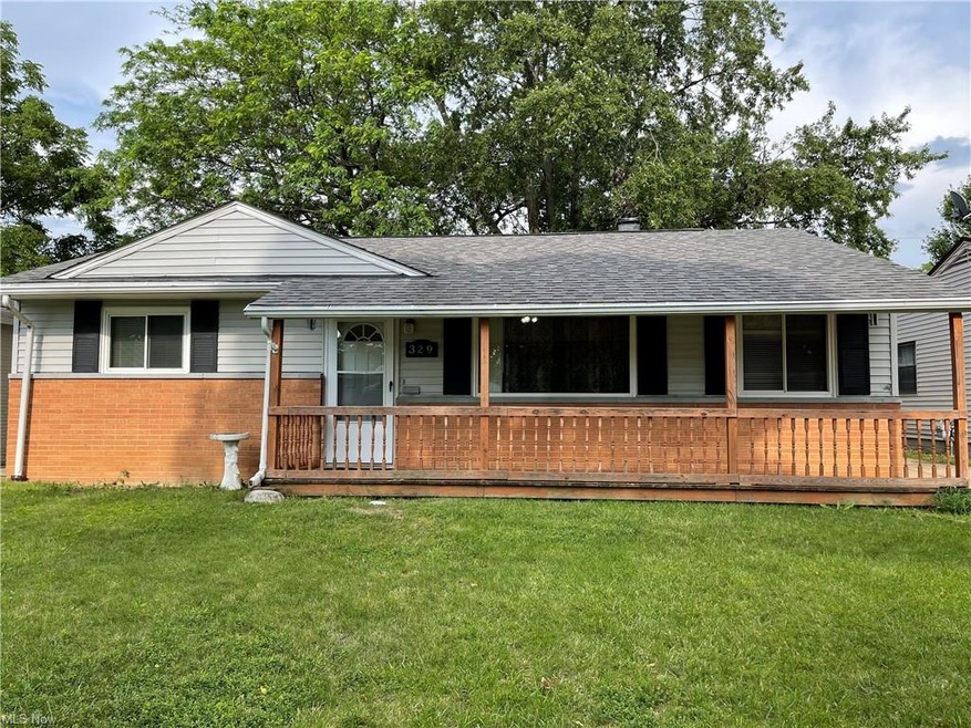 329 Thelma Dr, Sheffield Lake, OH 44054 - photo 1