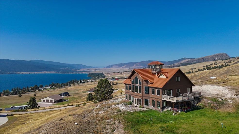 Mountain view featuring a nearby body of water