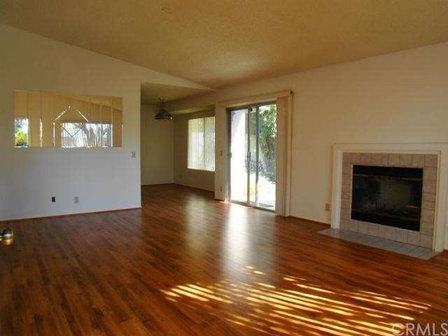 Living Room with gas and wood burning fireplace; d