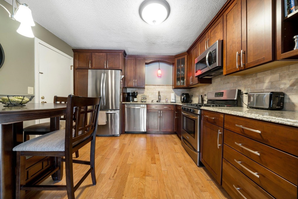 377 Huse Rd unit 2, Manchester, NH 03103 - photo 1