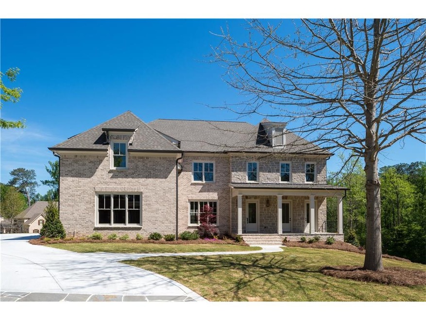 Front elevation.   Level sodded yard w/ deep front