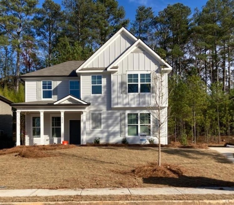 Craftsman inspired home featuring covered porch
