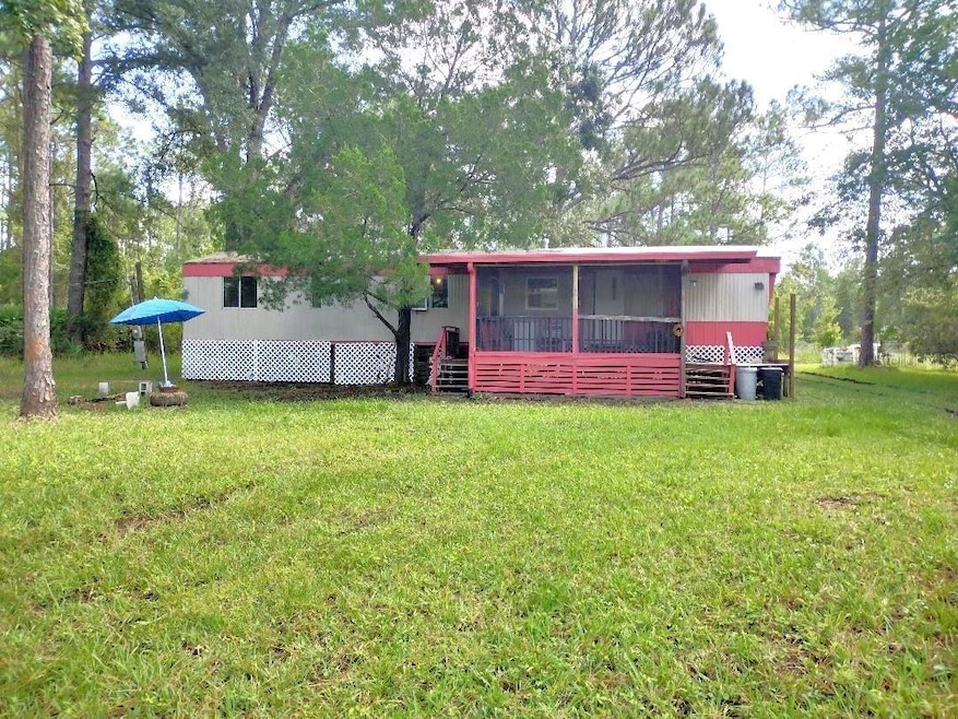 2667 Pine St, Bunnell, FL 32110 - photo 1