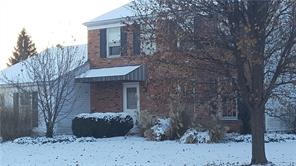 Exterior Front:  4 bedroom/2.5 bath home on large lot!  Needs some cosmetic TLC, but priced below market!