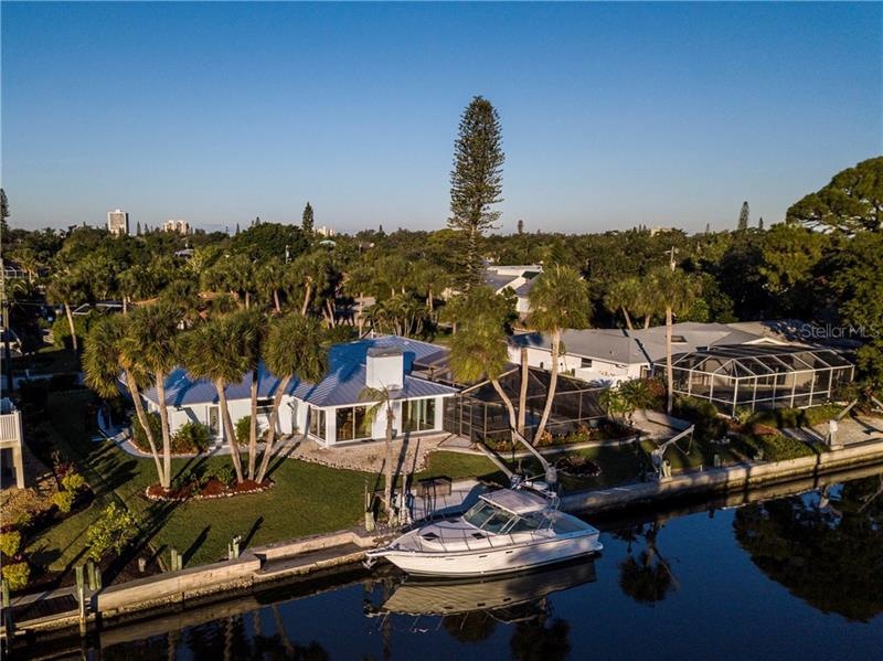 Aerial view of canal side of home