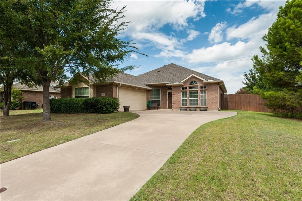 All brick home with nice shade trees.
