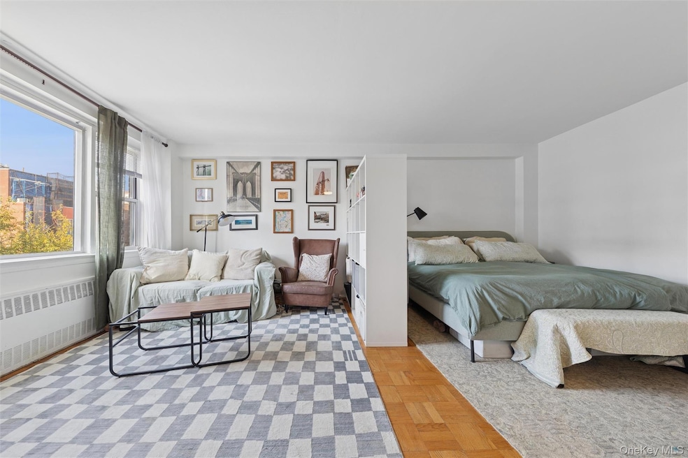 Bedroom featuring radiator