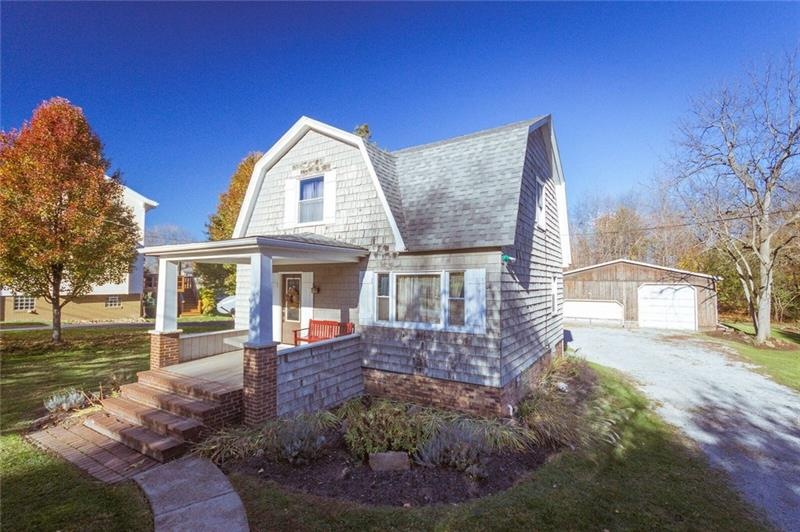 LOVELY CURVED SIDEWALK TO COVERED FRONT PORCH AT M