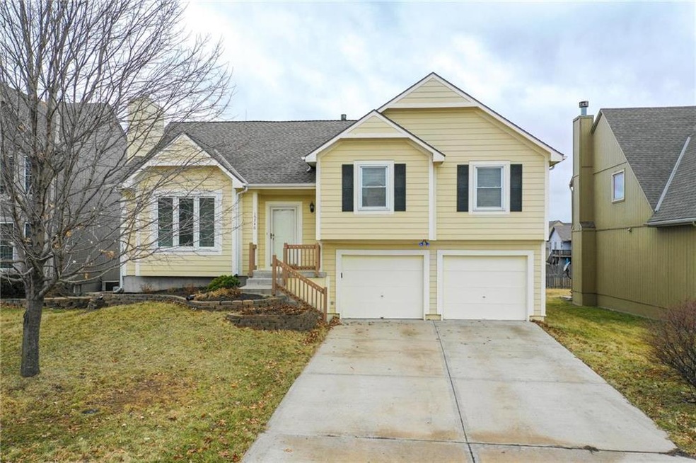 Desirable 4 bedroom, 3 bath front/back split home 