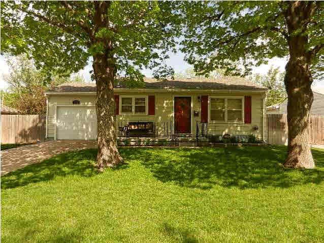 This Adorable Home on a Tree Lined Street is one y