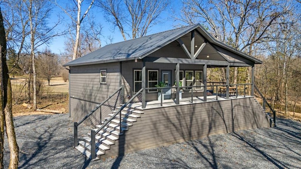 View of front of property featuring metal roof and