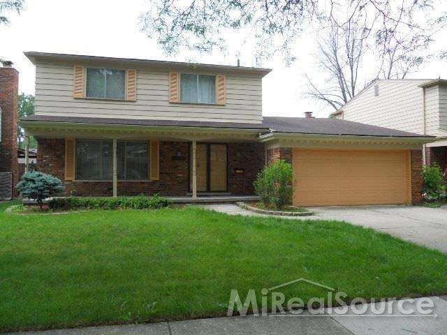Large front porch. Attached Garage.