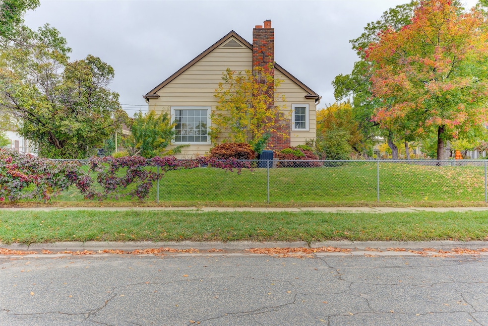 View of home's exterior with a chimney