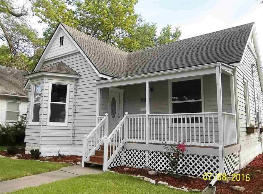 Beautiful Curb Appeal and lovely front porch.